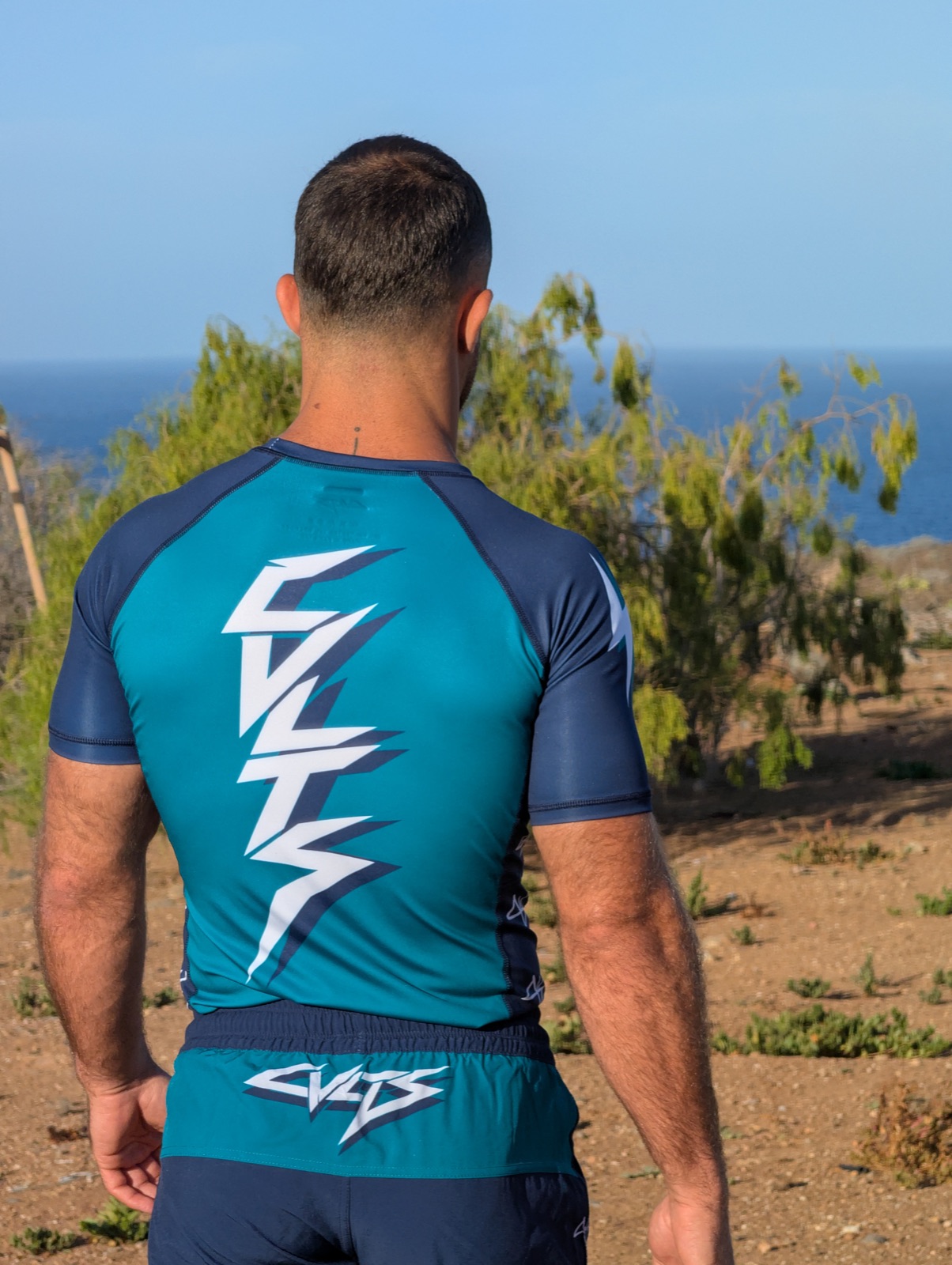 90s Bolt rashguard worn, back